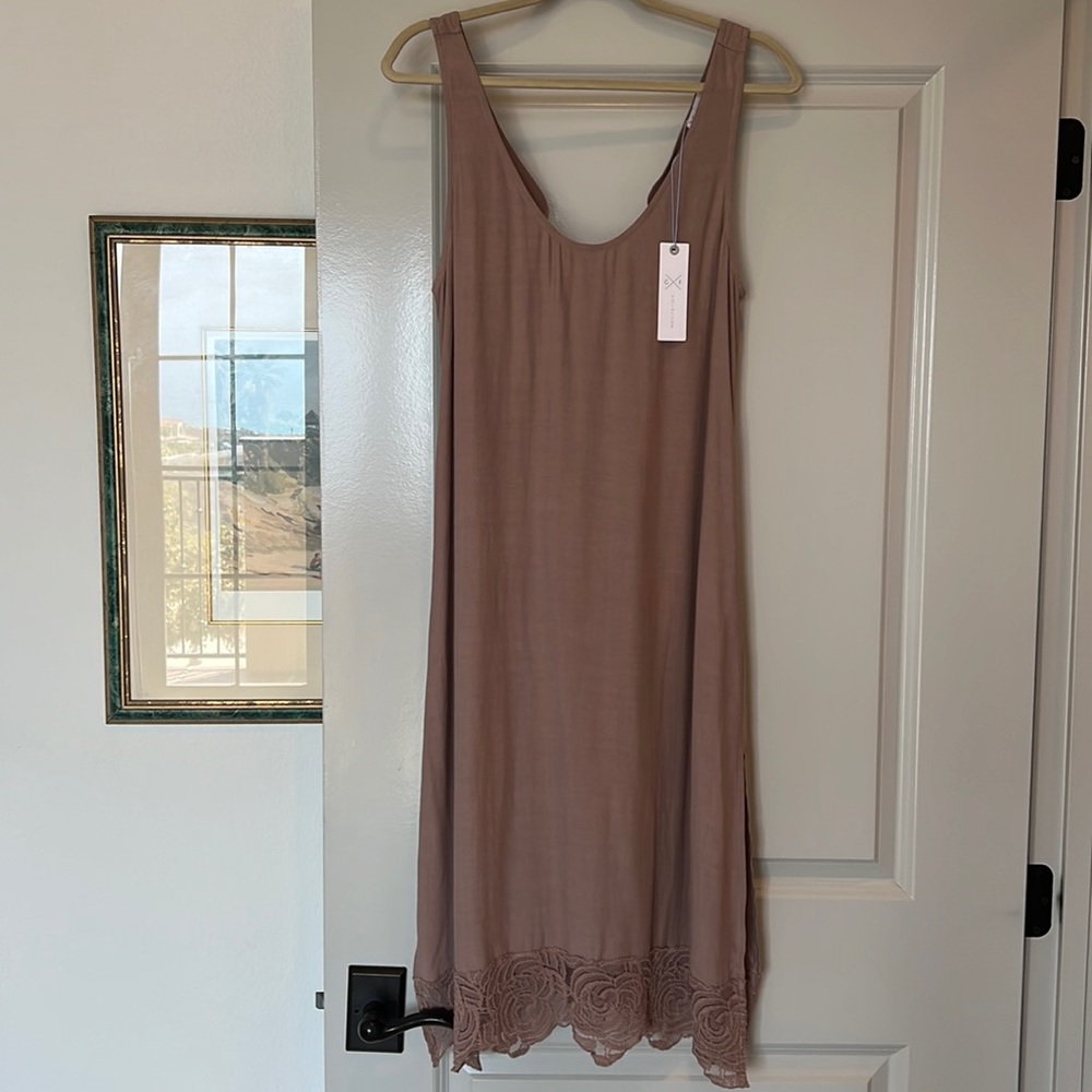 Sheath dress. Medium. Taupe/mauve color. Super flattering. Lace trim hem.